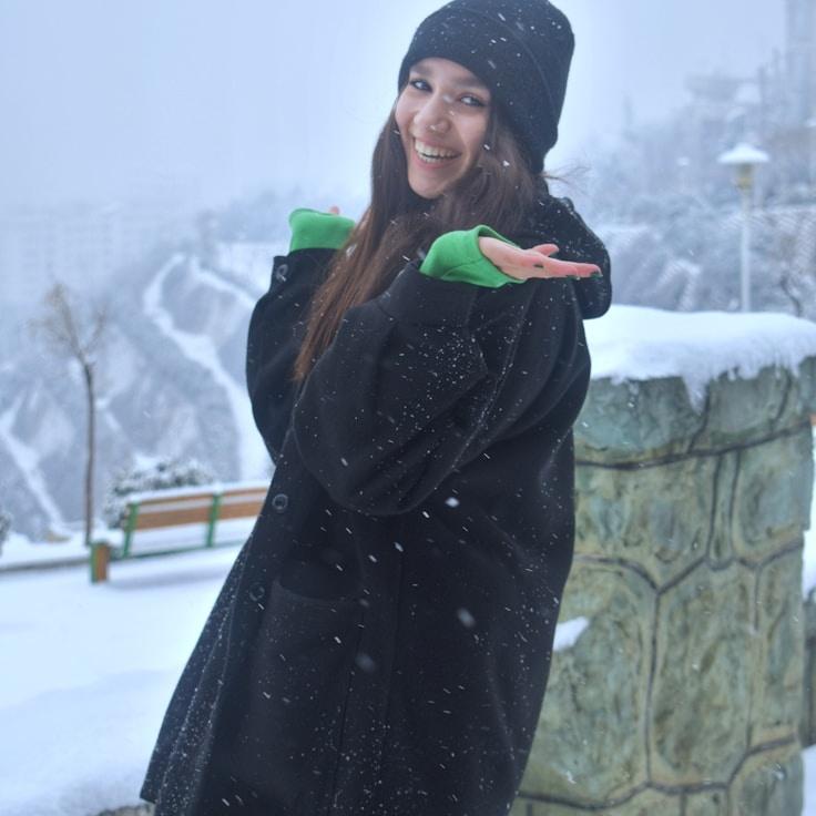 Mira Kapoor, Client Relations Director, discussing corporate gifting strategy with business clients